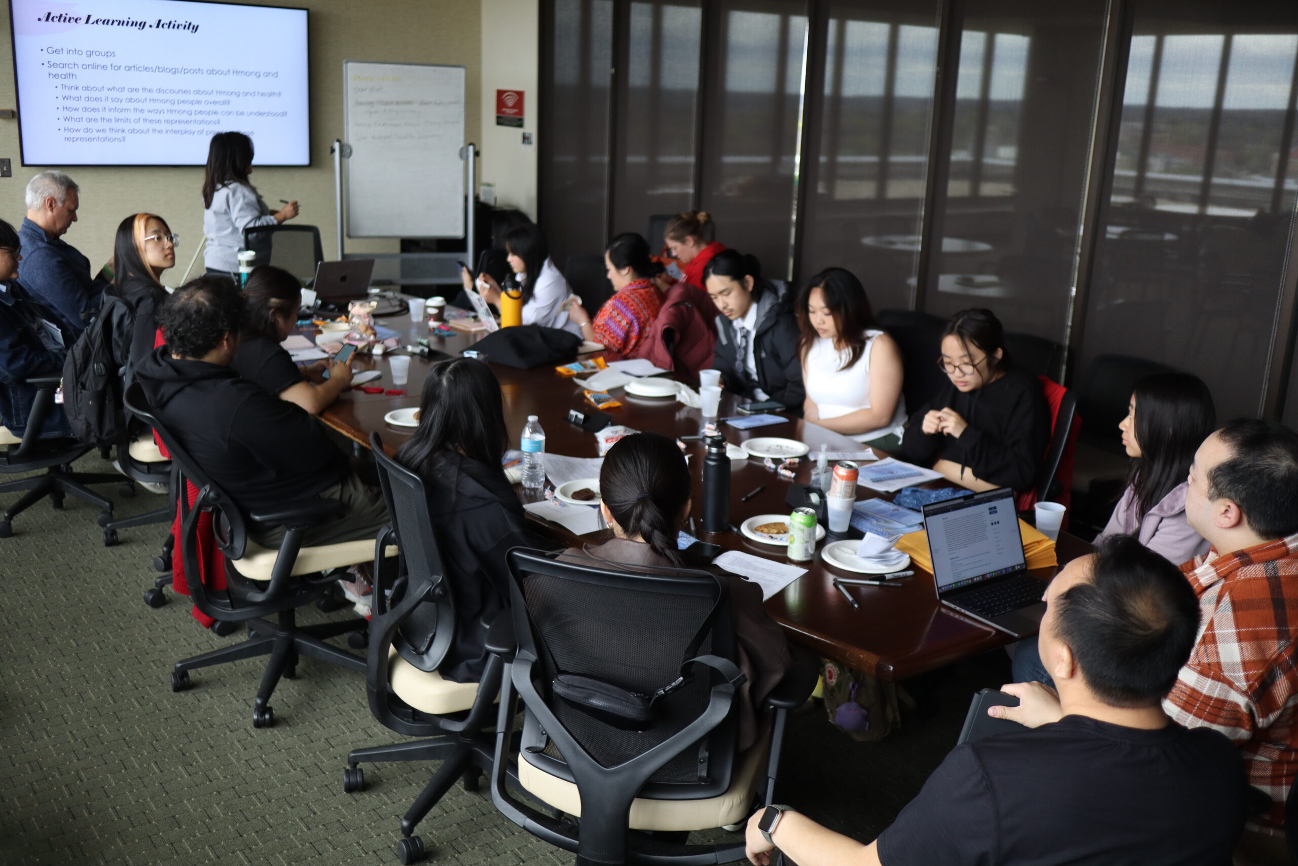 A group sitting around a conference table.